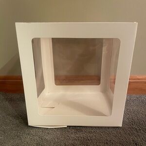 4 stackable white trim/clear center boxes